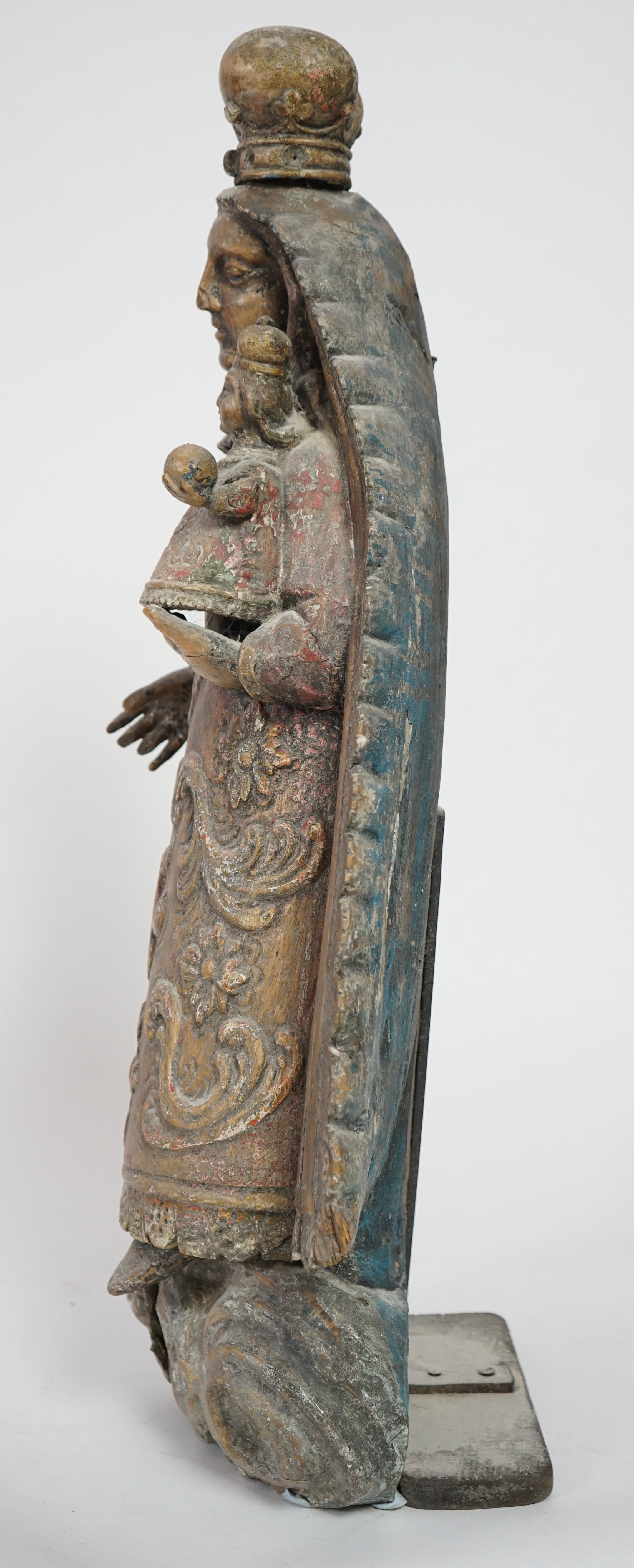 A late 18th century Spanish polychrome oak group of the Madonna and child